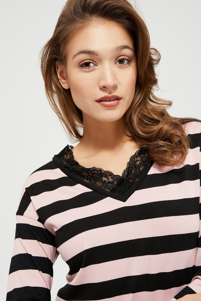 Blouse with lace at the neckline