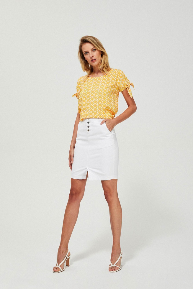 Pencil skirt with decorative buttons