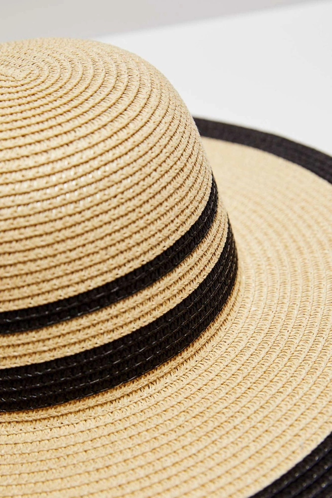 A straw hat with a wide brim