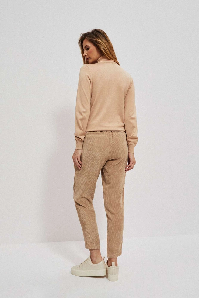 Corduroy trousers with a protruding leg