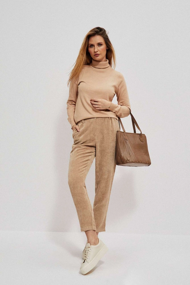 Corduroy trousers with a protruding leg