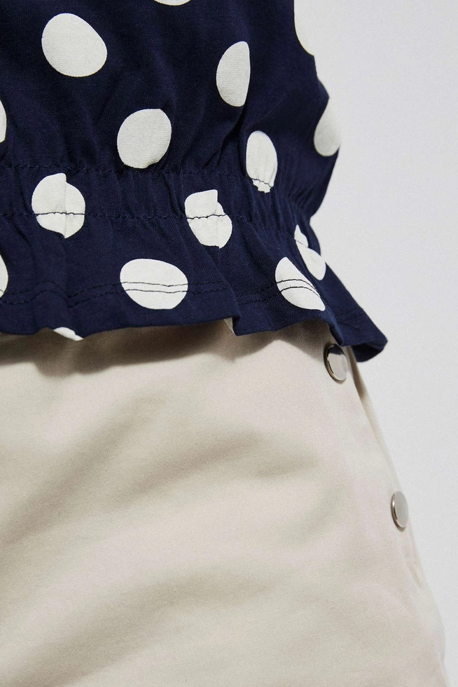 Polka dot blouse with a V-neckline