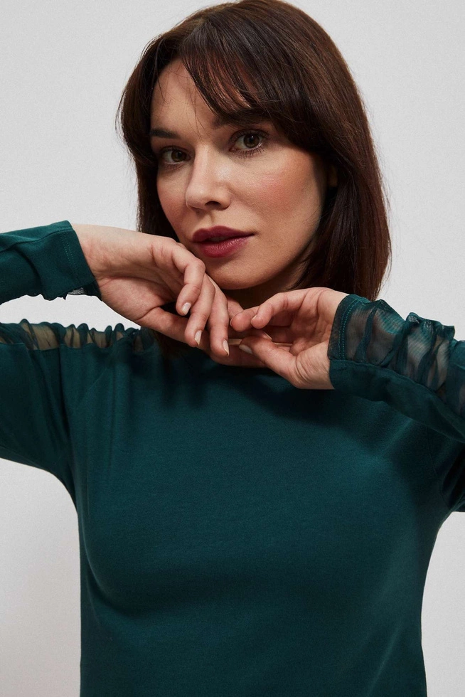 Blouse with transparent sleeves