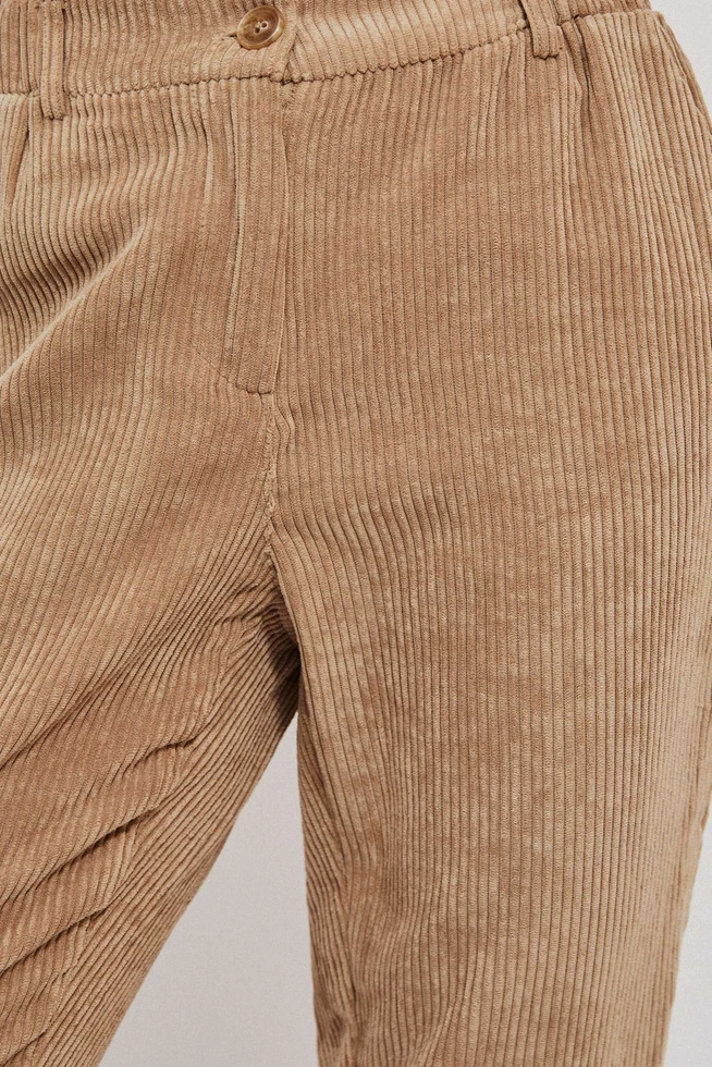 Corduroy trousers with a protruding leg