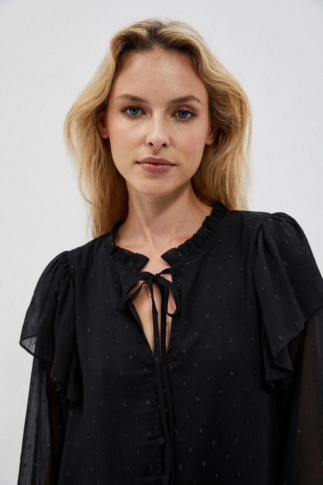 Shirt with a tied neckline and ruffles