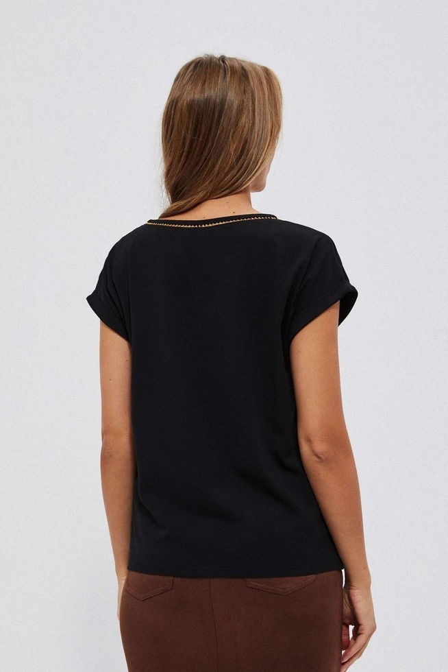 Plain blouse with a decorative neckline