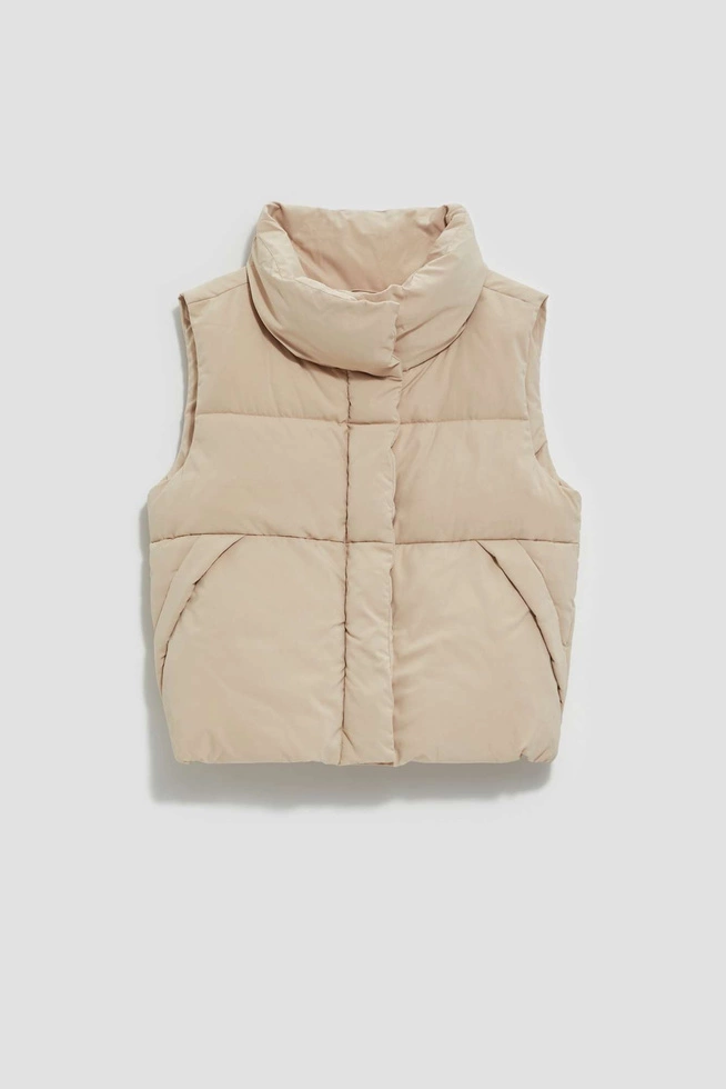 Short, quilted vest with a stand-up collar