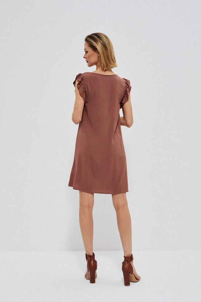 Dress with a frill at the sleeve