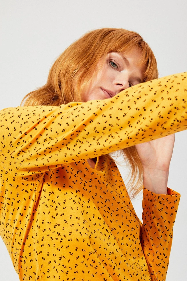 A floral blouse with a cut-out at the neckline