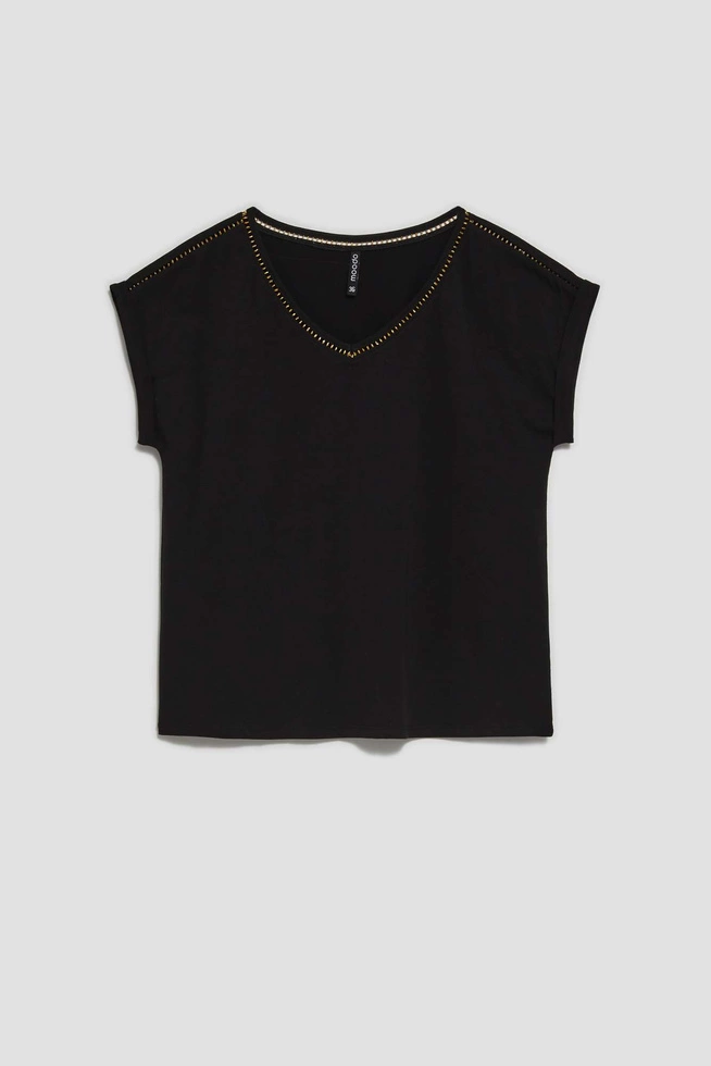 Plain blouse with a decorative neckline