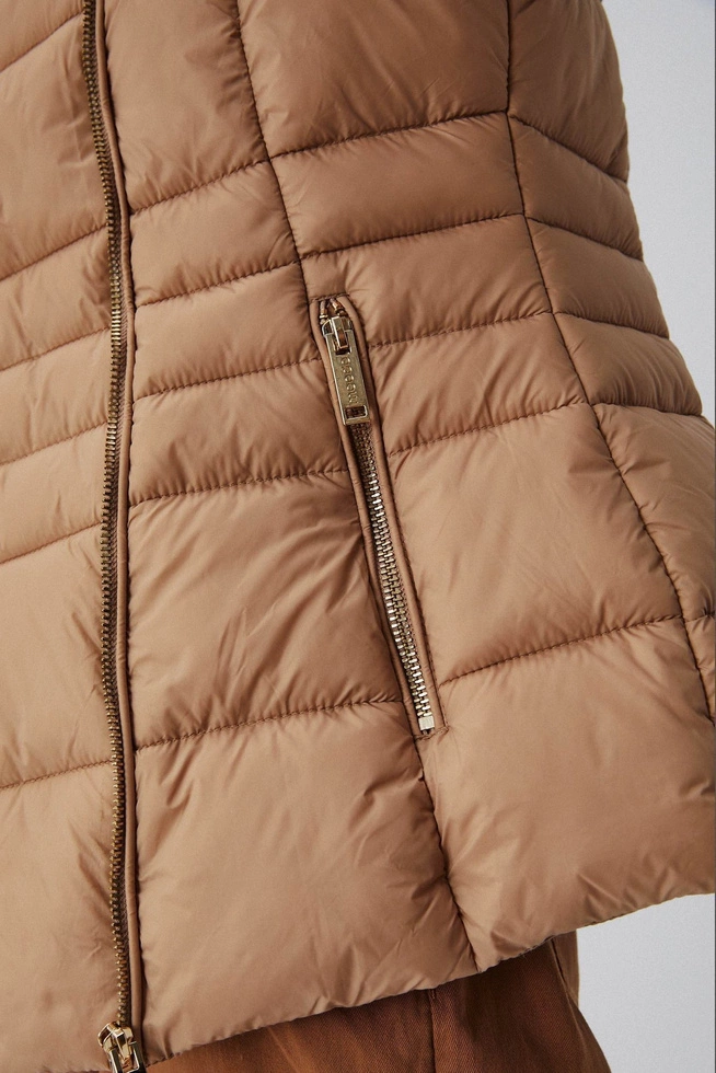 Quilted jacket with a teddy bear