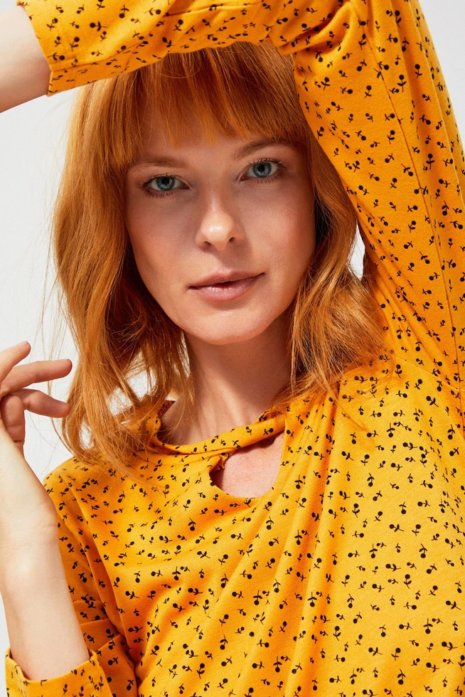 A floral blouse with a cut-out at the neckline